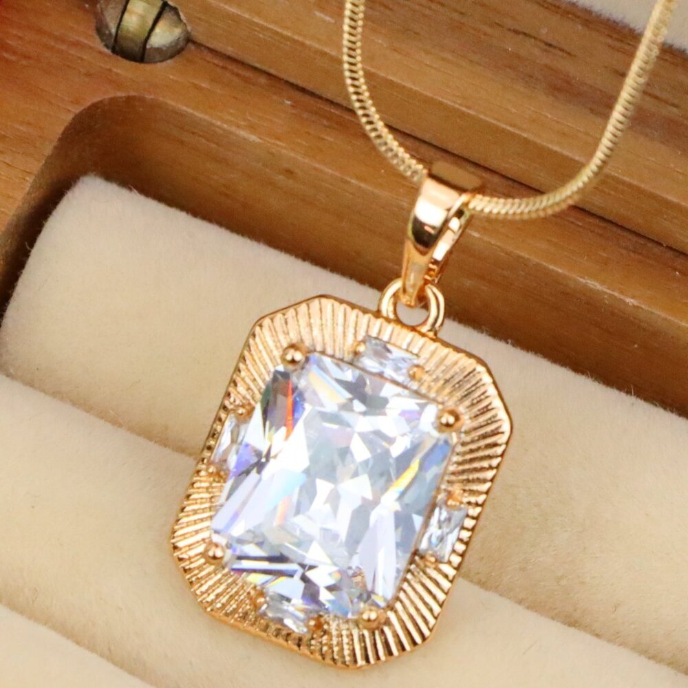 "White Emerald Cut Pendant with Textured Gold Frame and Shine, XPPT1782